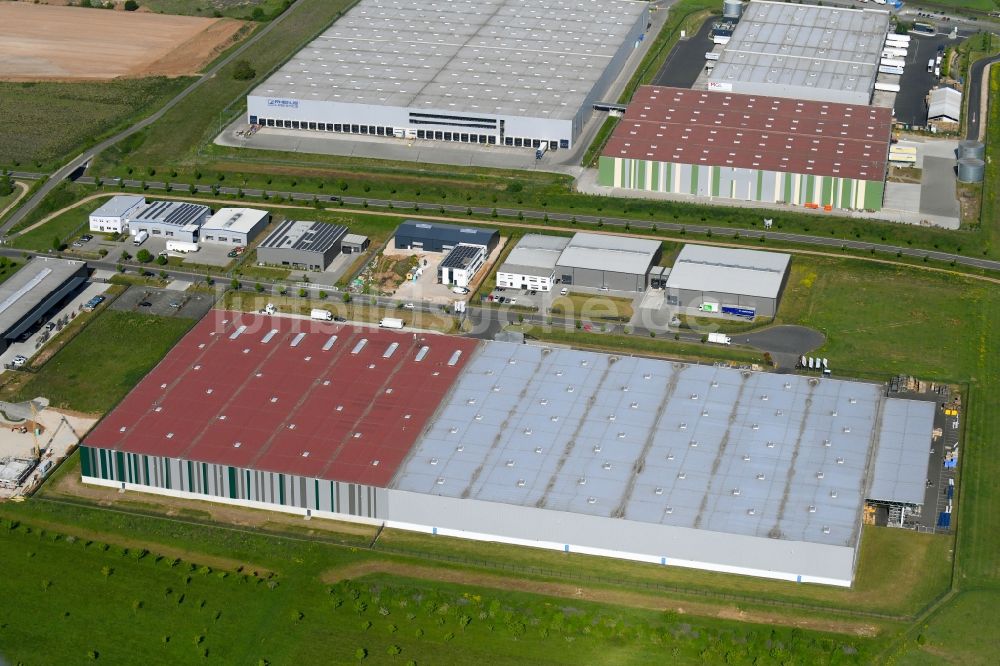 Grolsheim von oben - Gebäudekomplex und Logistikzentrum auf dem Gelände der MGL Metro Group Logistics Warehousing GmbH & Co. KG an der Albert-Schweitzer-Straße in Grolsheim im Bundesland Rheinland-Pfalz, Deutschland