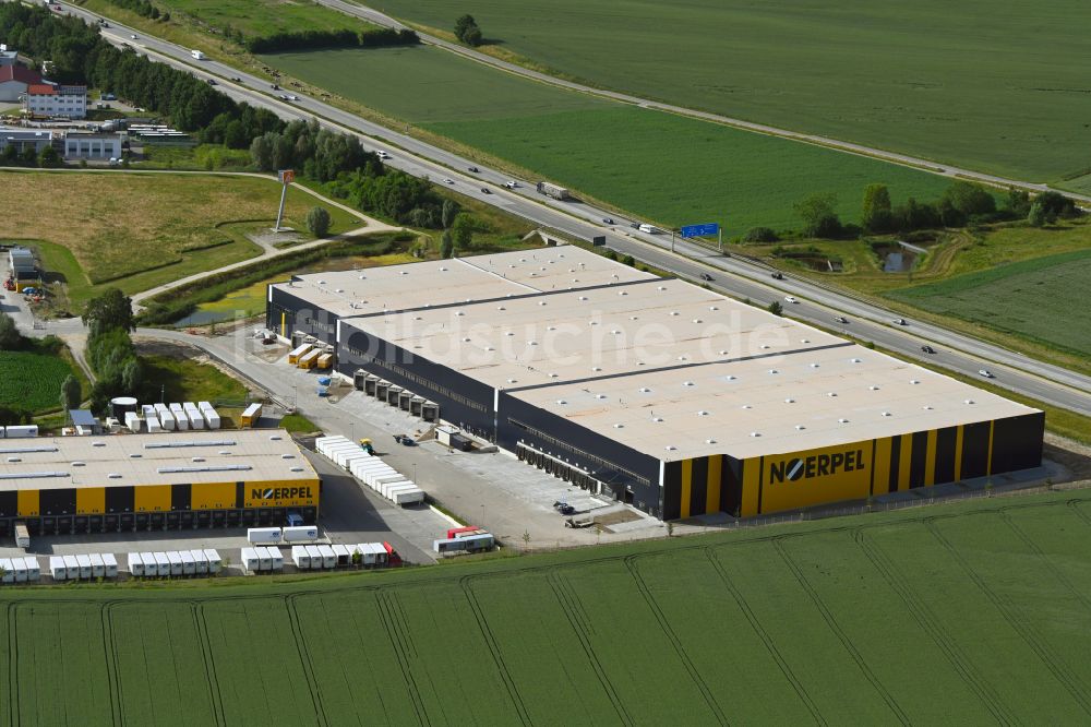 Odelzhausen aus der Vogelperspektive: Gebäudekomplex und Logistikzentrum auf dem Gelände der C.E. Noerpel GmbH in Odelzhausen im Bundesland Bayern, Deutschland