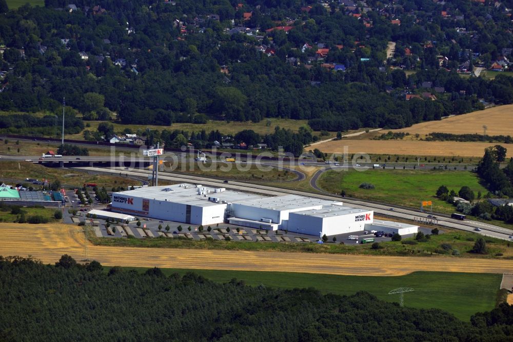 Vogelsdorf von oben - Gelände des Gewerbegebietes und Multicenter und Einkaufszentrums an der Autobahnabfahrt Vogelsdorf im Bundesland Brandenburg