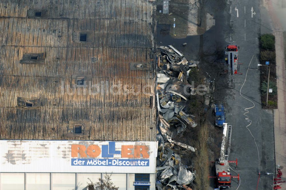 Eisenhüttenstadt von oben - Großbrand im Einkaufszentrum / large fire in a shopping center Eisenhüttenstadt