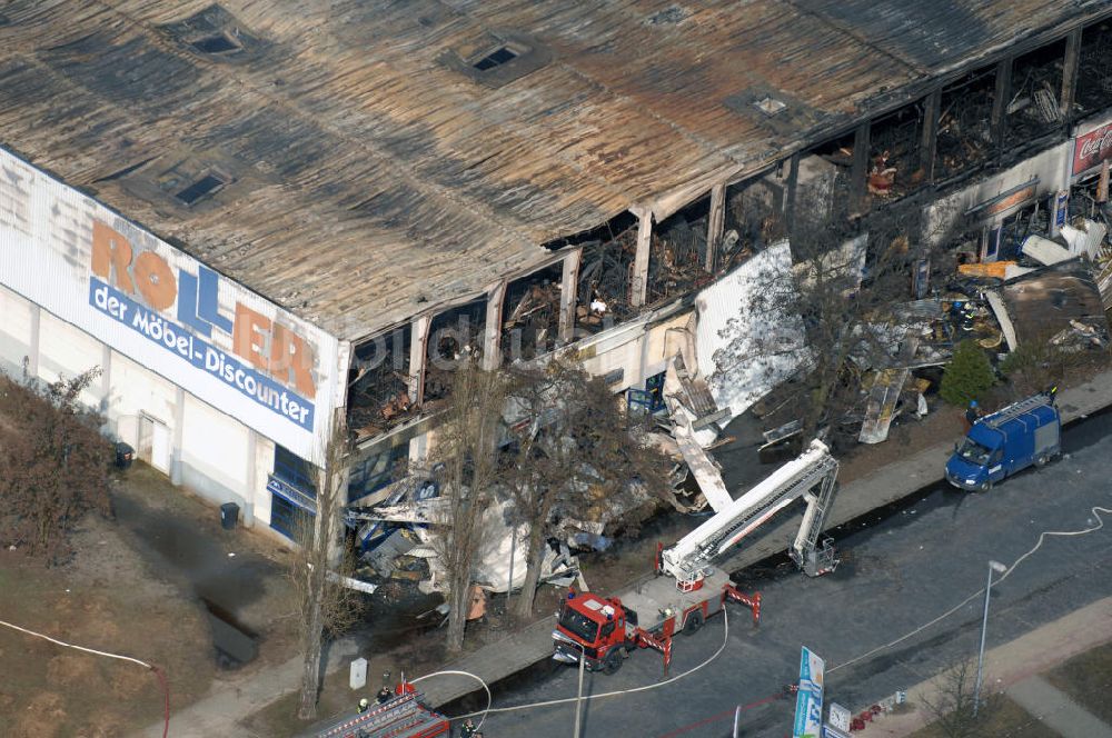 Eisenhüttenstadt von oben - Großbrand im Einkaufszentrum / large fire in a shopping center Eisenhüttenstadt