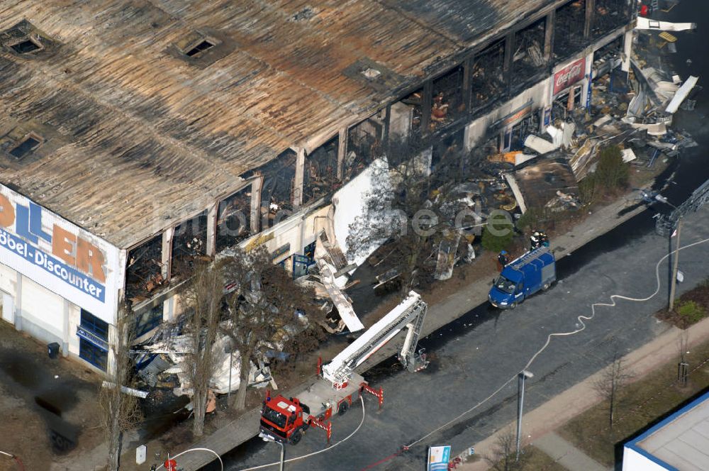 Luftbild Eisenhüttenstadt - Großbrand im Einkaufszentrum / large fire in a shopping center Eisenhüttenstadt