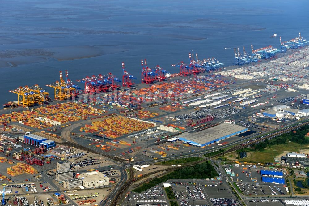 Luftbild Bremerhaven - Hafenanlagen und Terminals mit Lagerhallen und Speditions und Logistikunternehmen an der Weser- Mündung in Bremerhaven im Bundesland Bremen