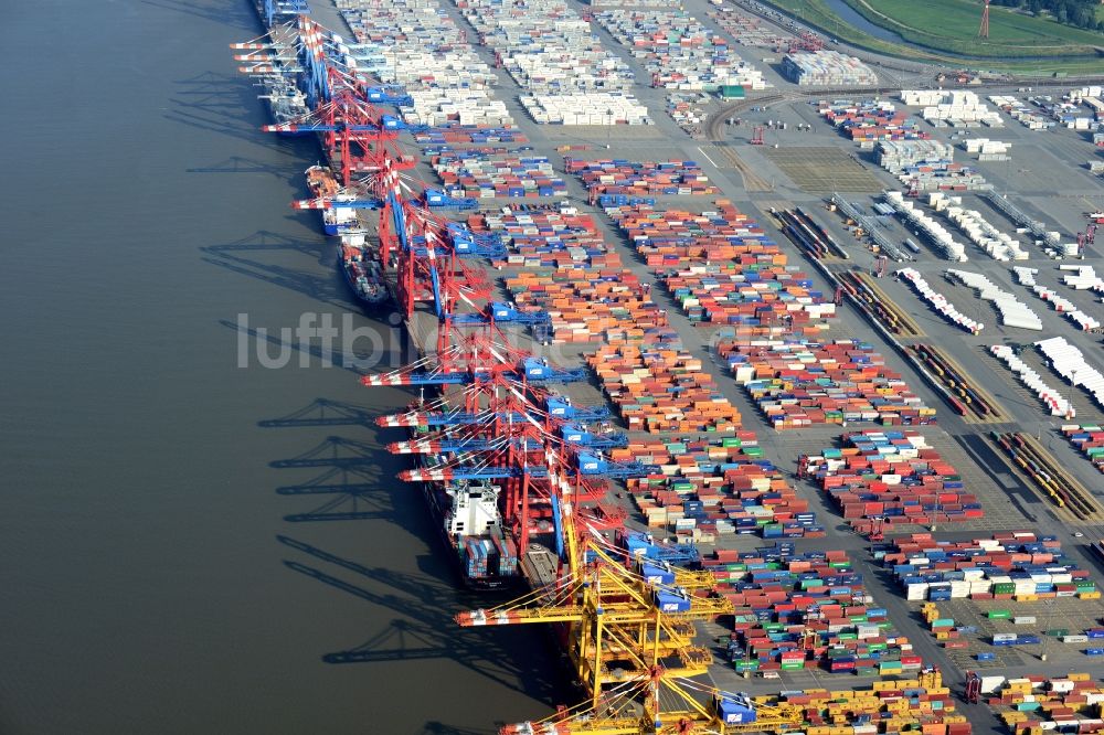 Luftaufnahme Bremerhaven - Hafenanlagen und Terminals mit Lagerhallen und Speditions und Logistikunternehmen an der Weser- Mündung in Bremerhaven im Bundesland Bremen