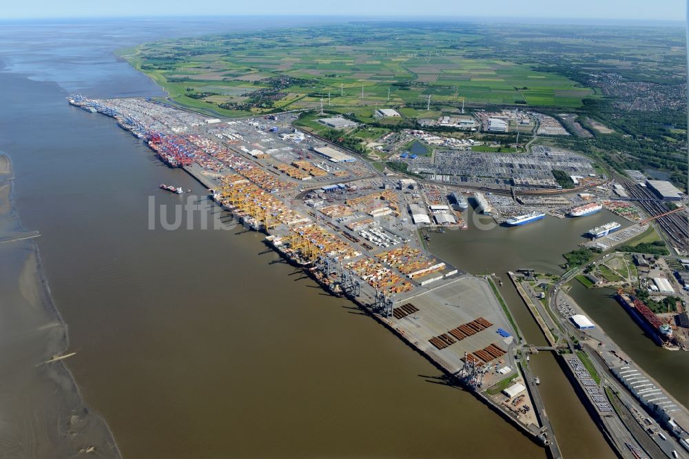 Bremerhaven von oben - Hafenanlagen und Terminals mit Lagerhallen und Speditions und Logistikunternehmen an der Weser- Mündung in Bremerhaven im Bundesland Bremen