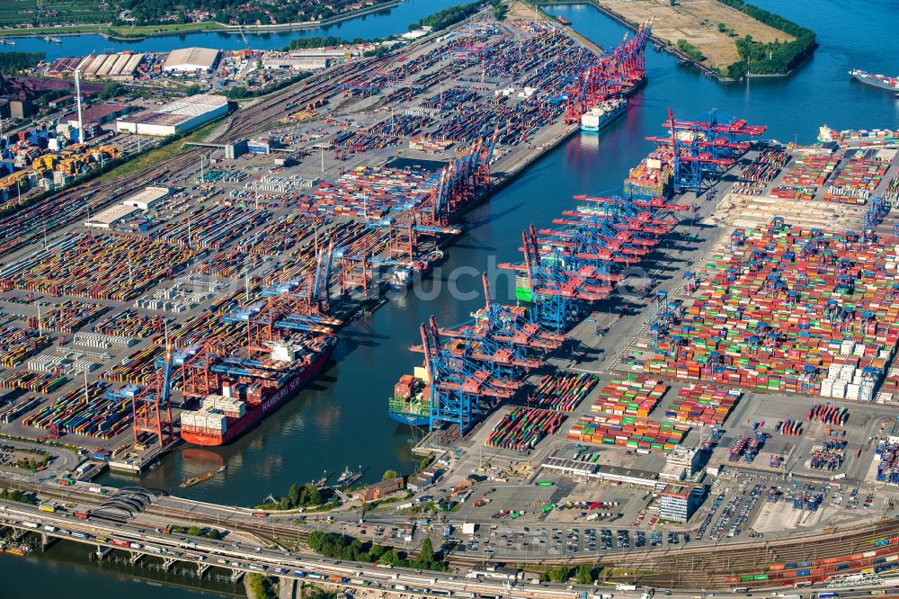 Hamburg aus der Vogelperspektive: HHLA Logistics Container Terminal Burchardkai,ein Containschiff wir geschleppt im Hamburger Hafen in Hamburg