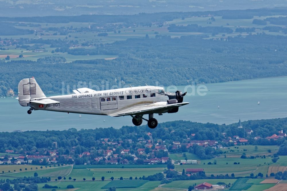 Luftbild Starnberg - Historisches Flugzeug Junkers 52 im Flug nahe dem Starnberger See im Bundesland Bayern