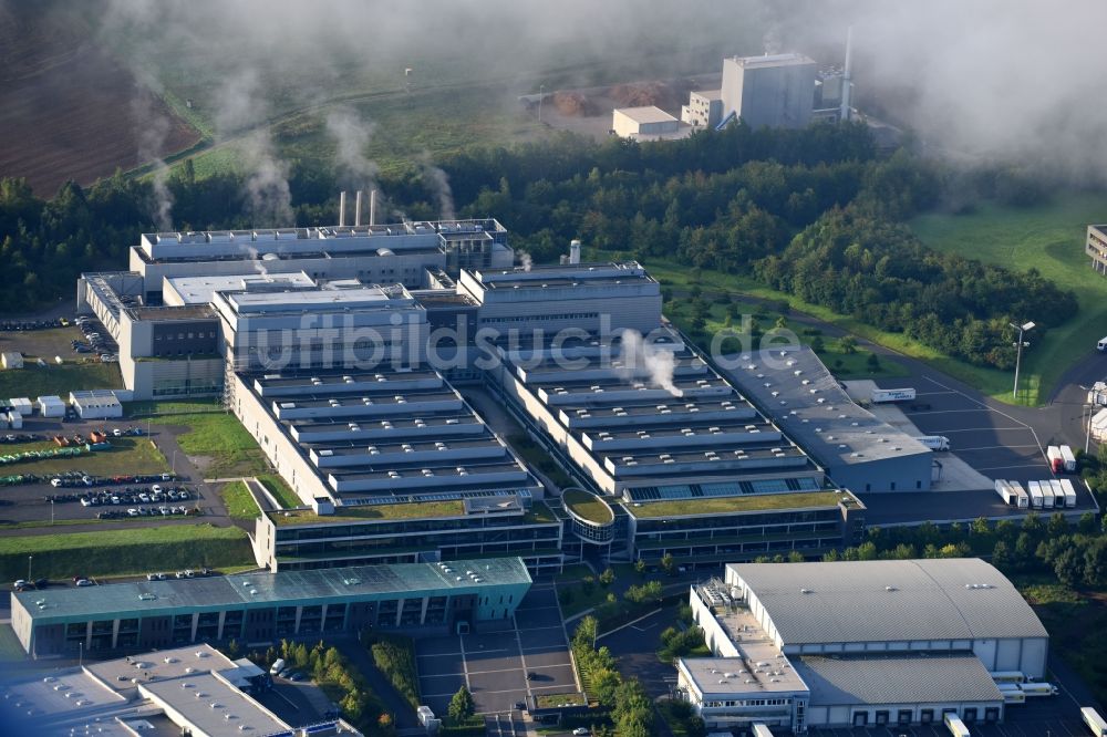 Melsungen aus der Vogelperspektive: Hochregal- Lager-Gebäudekomplex und Logistikzentrum auf dem Gelände der EDEKA Handelsgesellschaft Hessenring GmbH in Melsungen im Bundesland Hessen, Deutschland