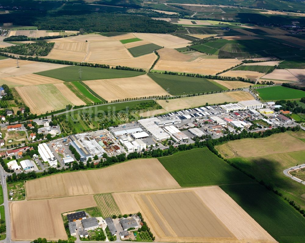 Luftbild Frauenzimmern - Industrie- und Gewerbegebiet am Rande von landwirtschaftlichen Feldern in Frauenzimmern im Bundesland Baden-Württemberg, Deutschland