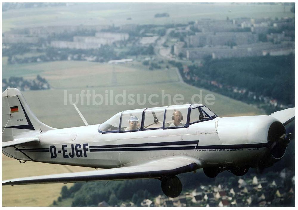 Chemnitz aus der Vogelperspektive: JAK 18 A der Fiedler - Airservice Jahnsdorf über dem Stadtrand und Umgebung von Chemnitz