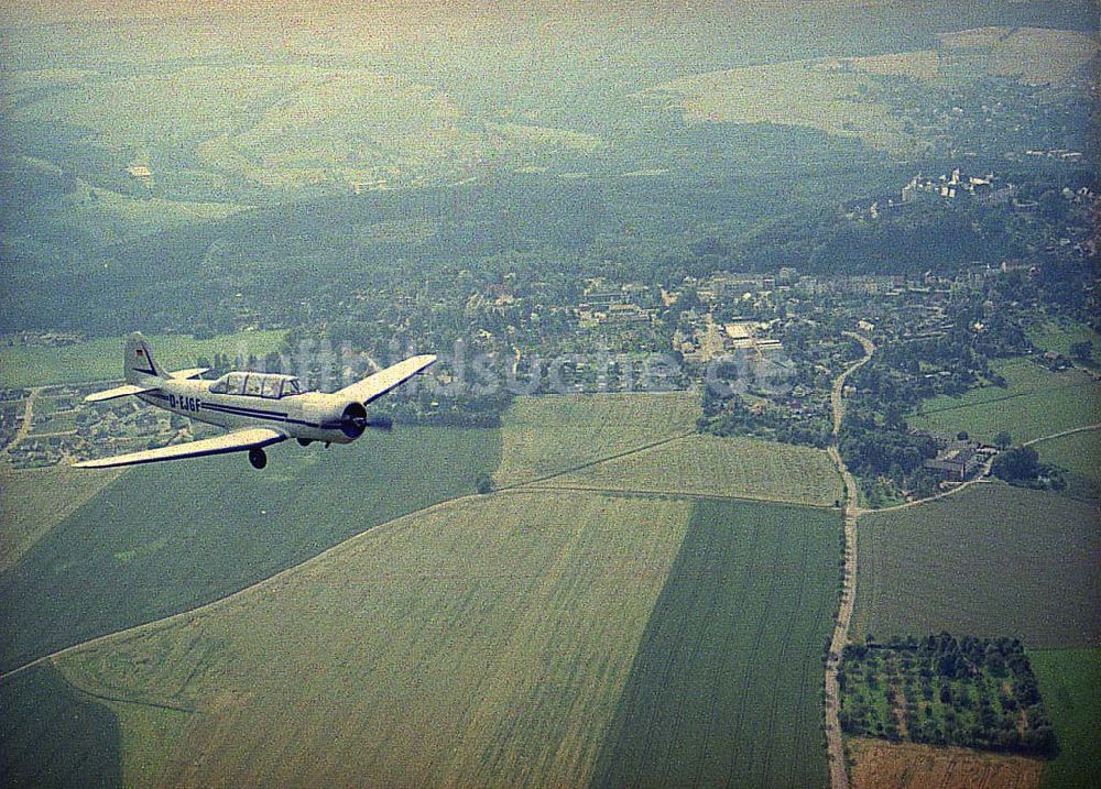 Chemnitz aus der Vogelperspektive: JAK 18 A der Fiedler - Airservice Jahnsdorf über dem Stadtrand und Umgebung von Chemnitz