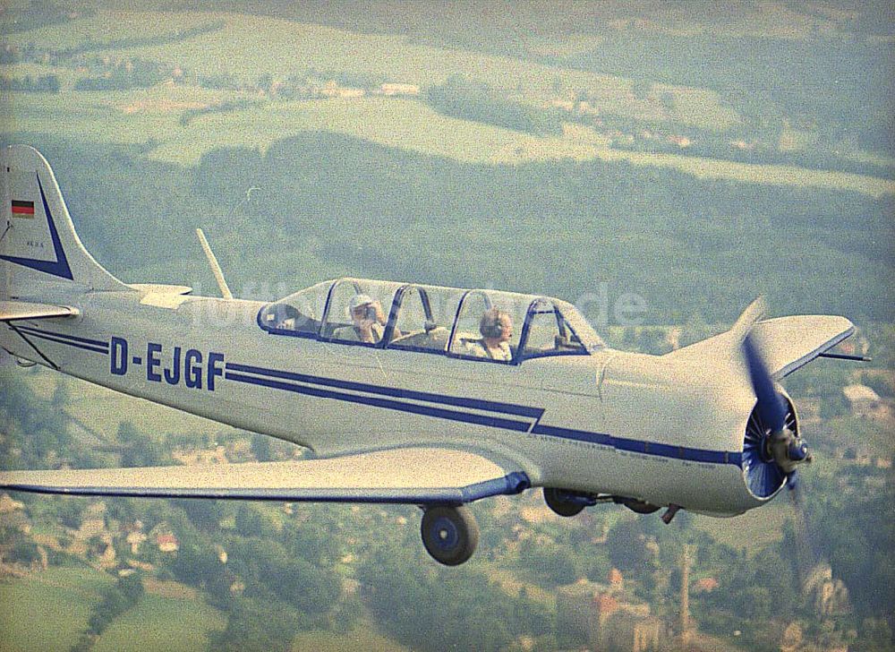 Chemnitz aus der Vogelperspektive: JAK 18 A der Fiedler - Airservice Jahnsdorf über dem Stadtrand und Umgebung von Chemnitz