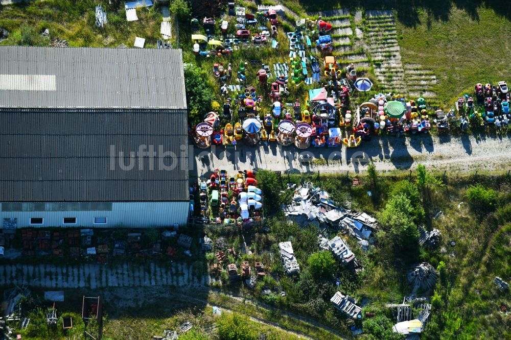 Woldegk aus der Vogelperspektive: Lagerfläche für ausrangierte Spielzeug- Automaten und Fahrautomaten am Mühlenblick Ecke Mühlengrundstraße im Gewerbegebiet in Woldegk im Bundesland Mecklenburg-Vorpommern, Deutschland