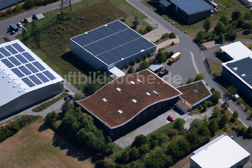 Grünsfeld aus der Vogelperspektive: Lagerhallen und Speditionsgebäude der NATURATA Logistik eG am Waltersberg in Grünsfeld im Bundesland Baden-Württemberg, Deutschland