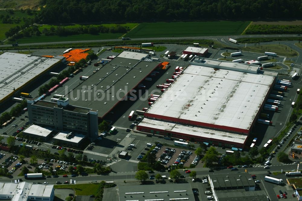 Rosbach vor der Höhe von oben - Lagerhallen und Speditionsgebäude REWE Zentrale Region Mitte in Rosbach vor der Höhe im Bundesland Hessen, Deutschland