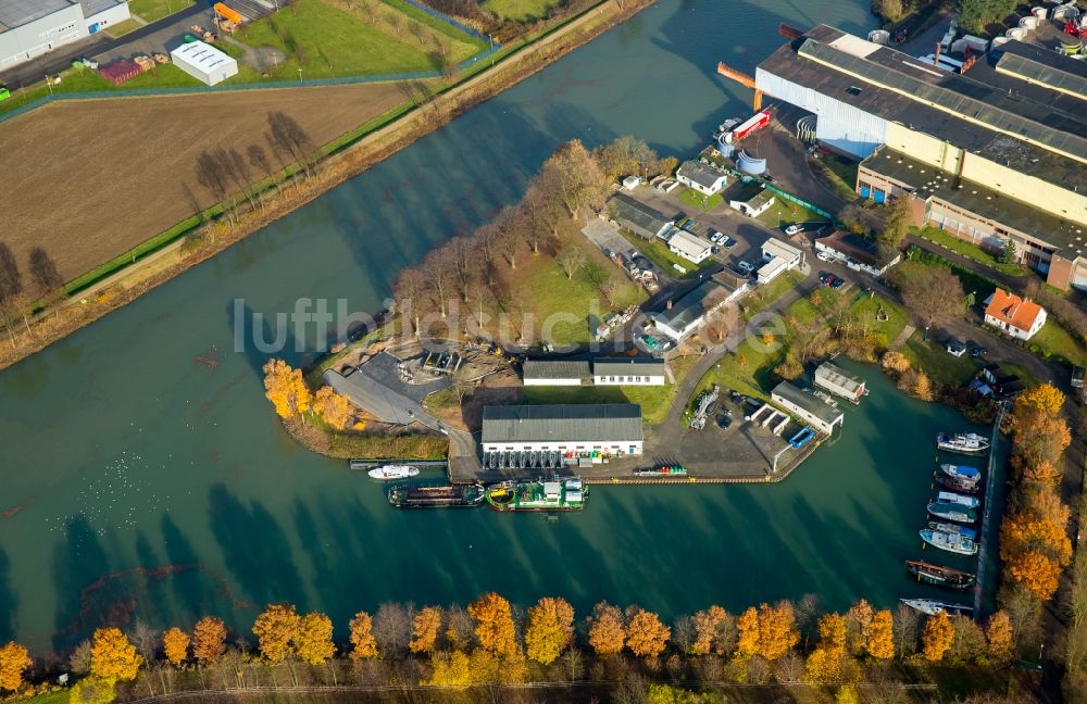 Luftaufnahme Voerde (Niederrhein) - Lagerhauskomplex- Gebäude im Gewerbegebiet WDK Hafen und Lager GmbH am Wesel-Datteln-Kanal im Ortsteil Spellen in Voerde (Niederrhein) im Bundesland Nordrhein-Westfalen