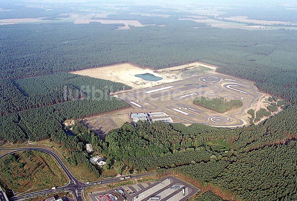 Luftbild Linthe / Brandenburg - Linthe / Brandenburg Blick auf eine Kiesgrube, Autoteststrecke und Autobahn A9 mit Autobahnzubringer (nach Brück) bei Linthe in Brandenburg