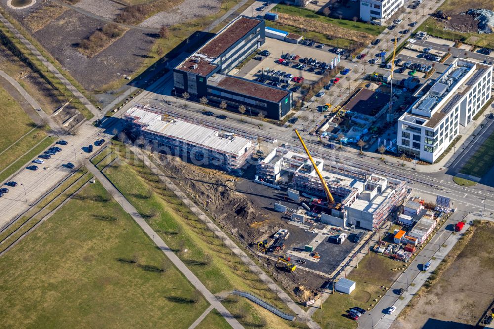 Dortmund von oben - Neubau eines Büro- und Geschäftshauses des Bechtle Campus an der Walter-Bruch-Straße in Dortmund im Bundesland Nordrhein-Westfalen, Deutschland