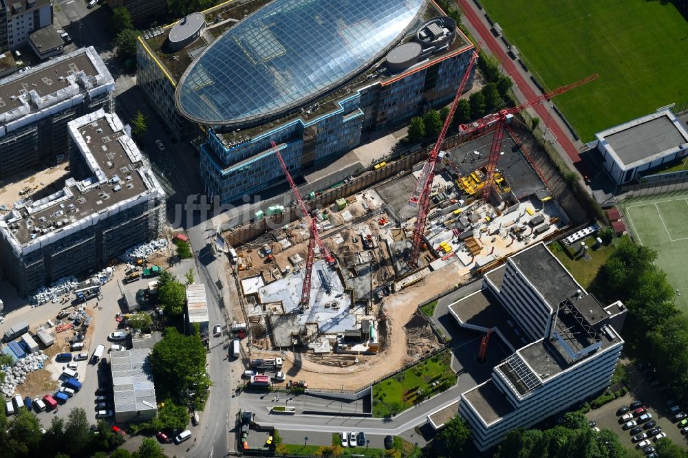 Düsseldorf von oben - Neubau eines Büro- und Geschäftshauses der Becken Holding GmbH an der Schwannstraße in Düsseldorf im Bundesland Nordrhein-Westfalen, Deutschland