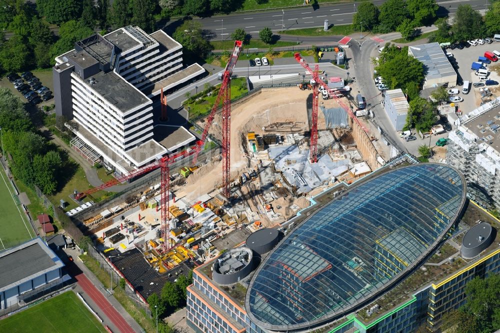 Düsseldorf von oben - Neubau eines Büro- und Geschäftshauses der Becken Holding GmbH an der Schwannstraße in Düsseldorf im Bundesland Nordrhein-Westfalen, Deutschland