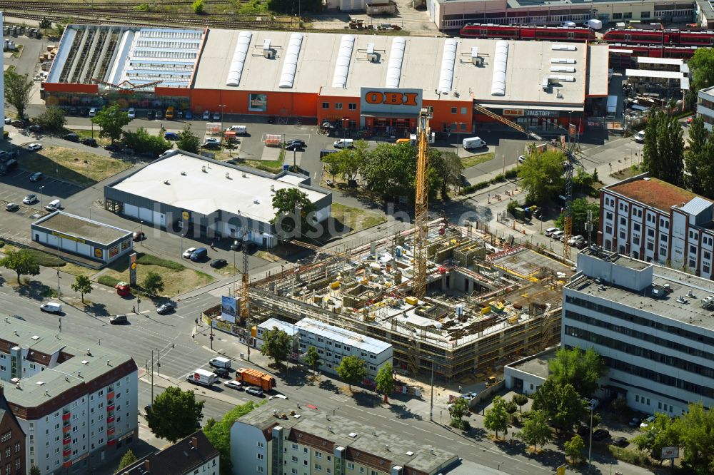 Luftbild Berlin - Neubau eines Büro- und Geschäftshauses an der Frankfurter Allee Ecke Buchberger Straße im Ortsteil Lichtenberg in Berlin, Deutschland