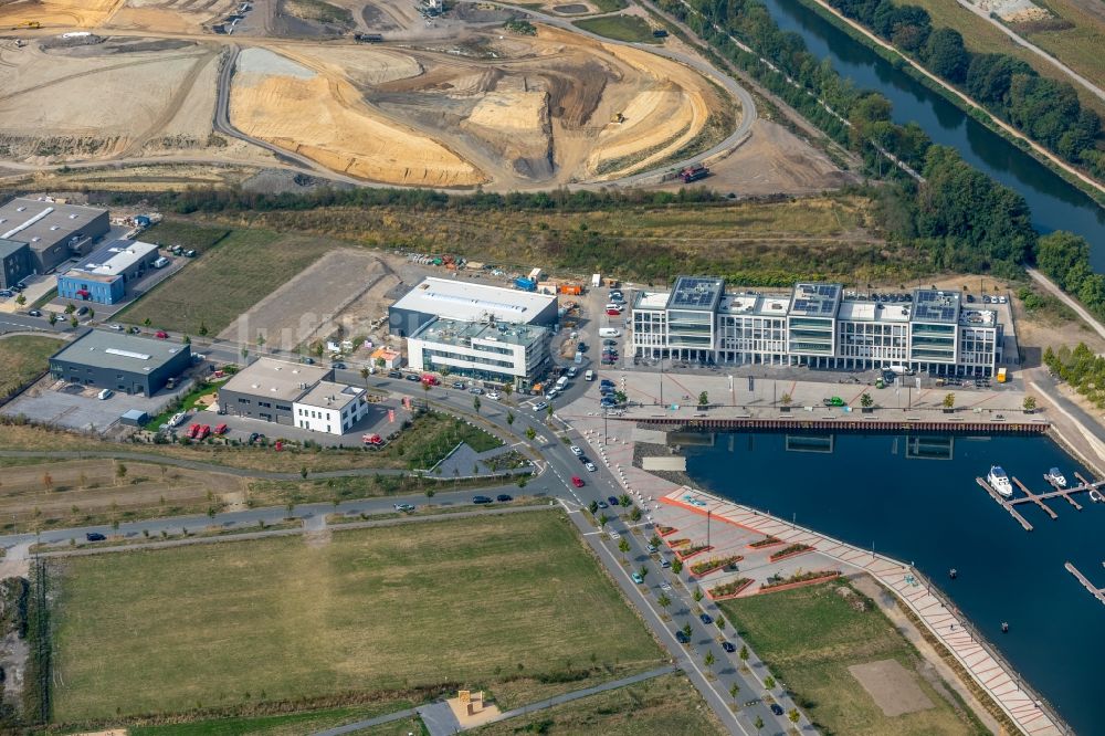 Gelsenkirchen von oben - Neubau eines Büro- und Geschäftshauses der Purax GmbH an der Johannes-Rau-Allee in Gelsenkirchen im Bundesland Nordrhein-Westfalen, Deutschland