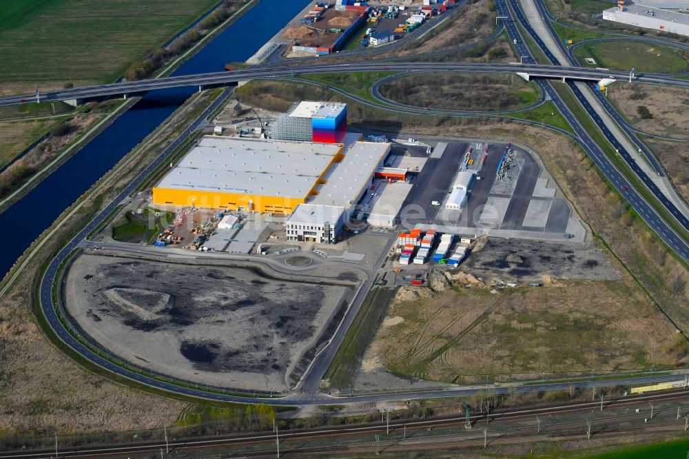 Wustermark von oben - Neubau eines Hochregal- Lager-Gebäudekomplex und Logistikzentrum auf dem Gelände dm VZ Verteilerzentrum in Wustermark im Bundesland Brandenburg, Deutschland