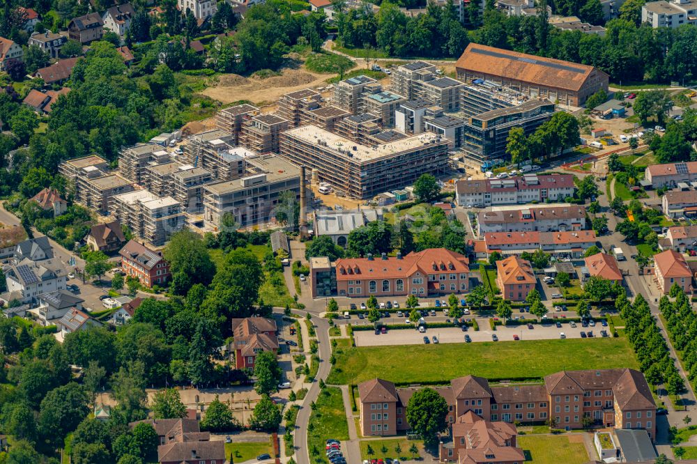 Achern von oben - Neubau des Unternehmens-Verwaltungsgebäude IT Campus Powercloud in Achern im Bundesland Baden-Württemberg, Deutschland