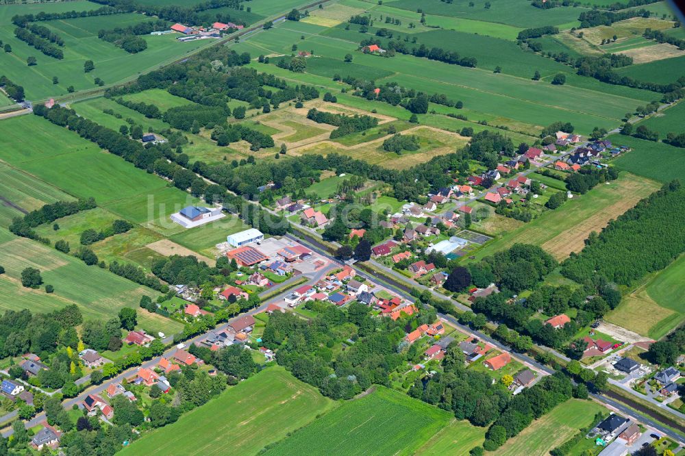 Luftaufnahme Holterfehn - Ortsansicht am Rande von landwirtschaftlichen Feldern in Holterfehn im Bundesland Niedersachsen, Deutschland