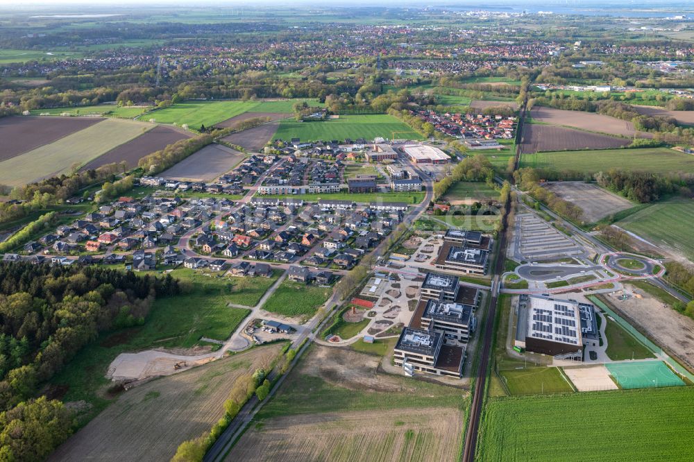 Stade aus der Vogelperspektive: Ortsansicht von Riensförde Heidesiedlung mir dem Famila Lebensmittelmarkt im Bundesland Niedersachsen, Deutschland