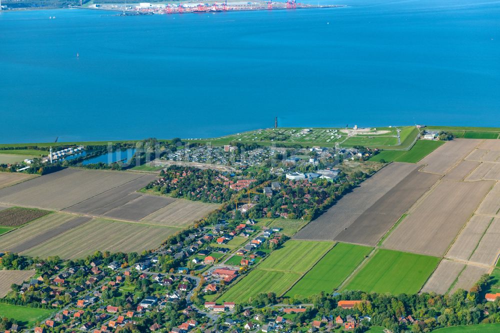 Luftaufnahme Butjadingen - Ortsansicht von Tossens in Butjadingen im Bundesland Niedersachsen, Deutschland