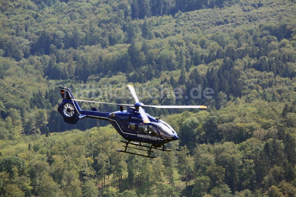 Rheinfelden (Baden) von oben - Polizeihubschrauber Helikopter - Hubschrauber EC 135 der Bundespolizei D-HVBD im Fluge über dem Luftraum in Rheinfelden (Baden) im Bundesland Baden-Württemberg