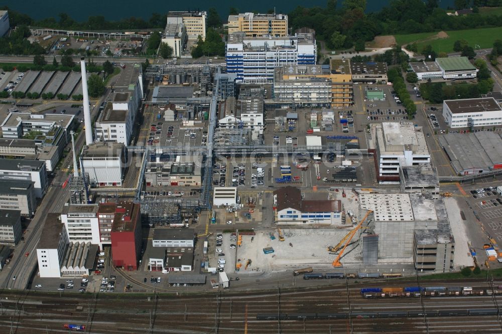 Luftbild Muttenz - Rückbau eines Silo -Gebäudekomplex und Logistikzentrum auf dem Gelände der Novartis Pharma Schweizerhalle an der Rothausstrasse in Muttenz im Kanton Basel-Landschaft, Schweiz