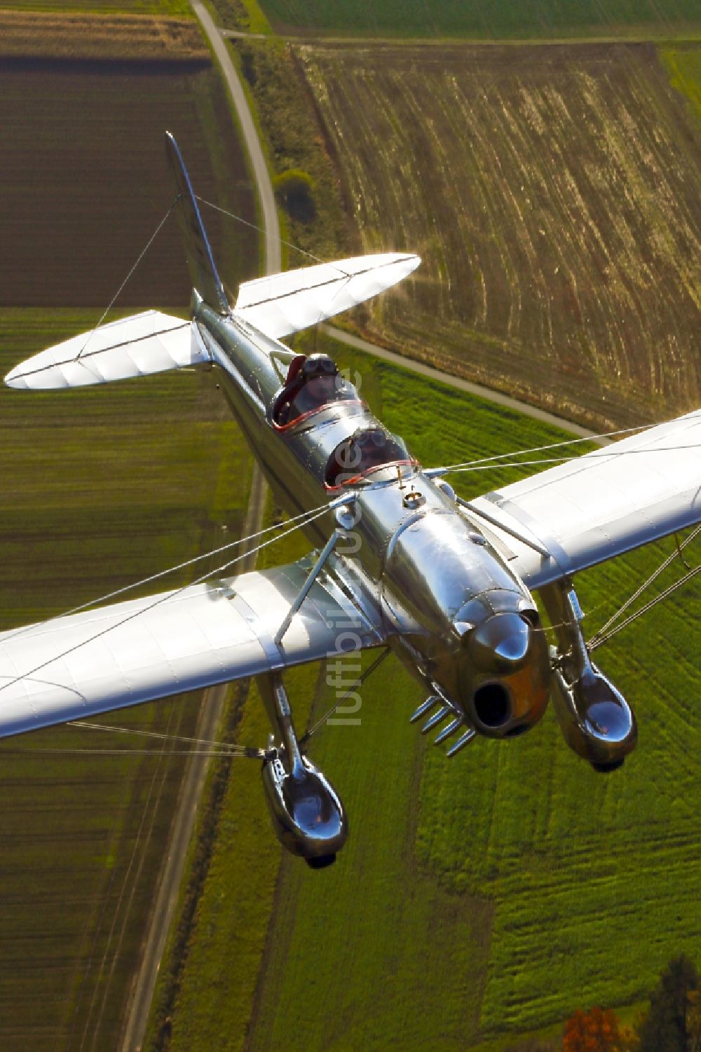 Mengen aus der Vogelperspektive: Restauriertes Flugzeug RYAN STA SPECIAL Star Ship beim Flug bei Mengen im Bundesland Baden-Württemberg