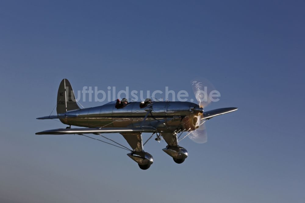 Luftaufnahme Mengen - Restauriertes Flugzeug RYAN STA SPECIAL Star Ship beim Flug bei Mengen im Bundesland Baden-Württemberg