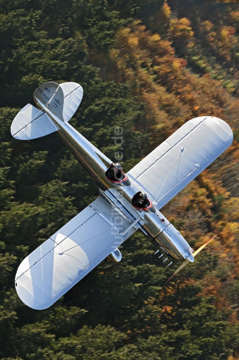 Mengen aus der Vogelperspektive: Restauriertes Flugzeug RYAN STA SPECIAL Star Ship beim Flug bei Mengen im Bundesland Baden-Württemberg