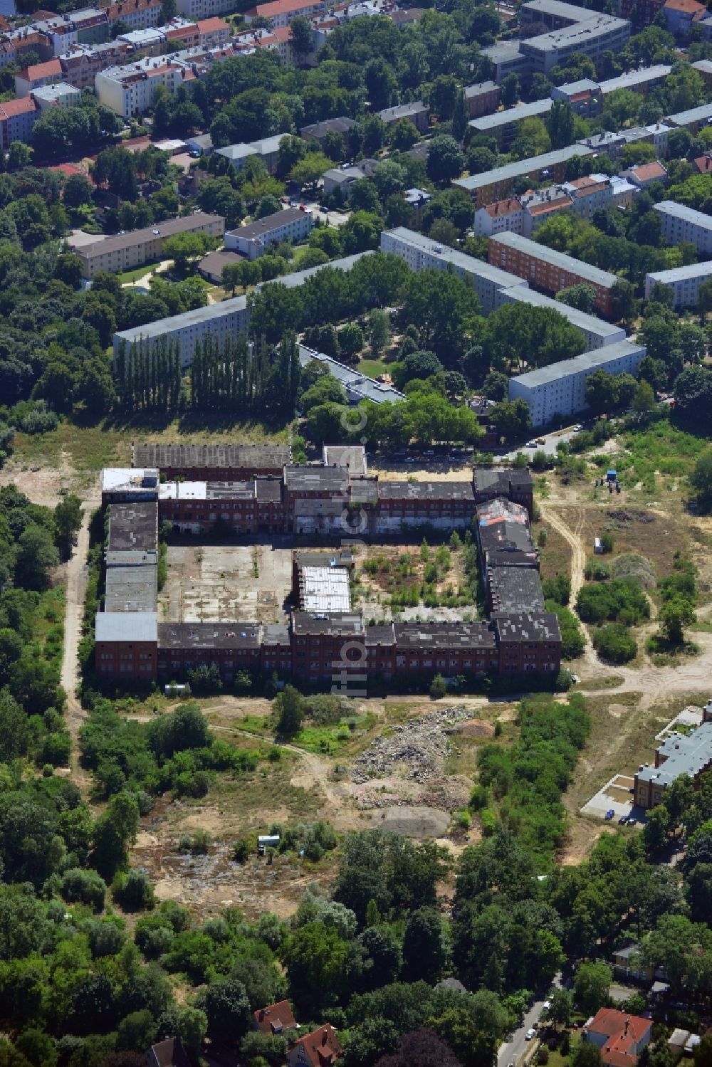 Luftbild Berlin - Ruine der ehemaligen Spindlerschen Reinigungsfabrik REWATEX im Planungsgebiet der Wasserstadt Spindlersfeld