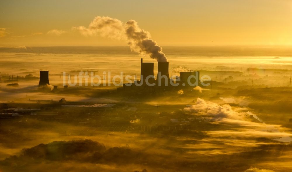 Hamm aus der Vogelperspektive: Sonnenaufgang am Kohlekraftwerk der RWE im Ortsteil Schmehausen von Hamm in Nordrhein-Westfalen