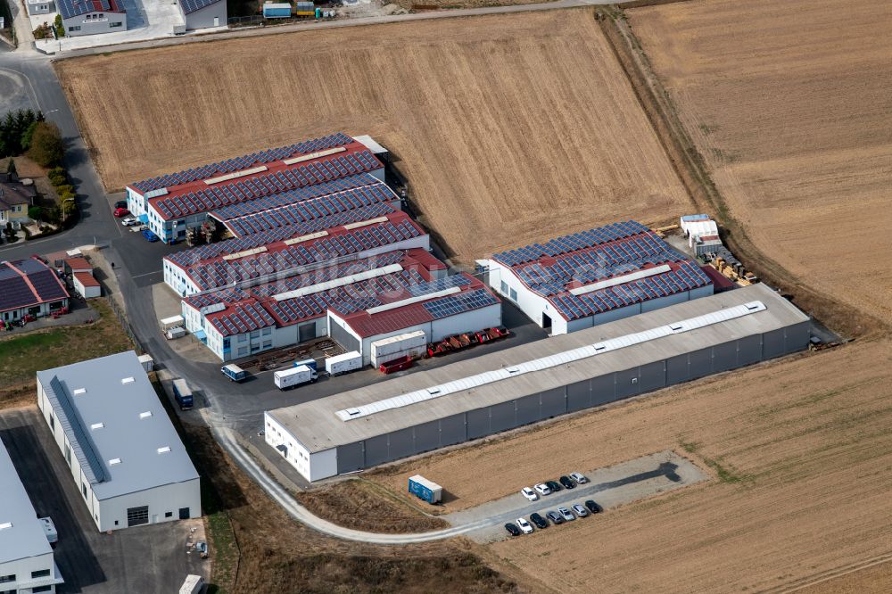 Steinfeld aus der Vogelperspektive: Werksgelände der SCHMELZMETALL Deutschland GmbH und der INHATEC GmbH & Co. KG an der Raiffeisenstraße im Ortsteil Hausen in Steinfeld im Bundesland Bayern, Deutschland