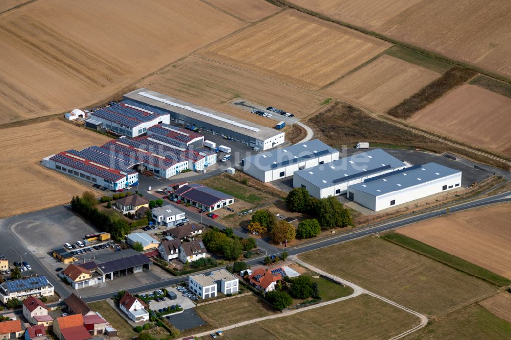 Steinfeld aus der Vogelperspektive: Werksgelände der SCHMELZMETALL Deutschland GmbH und der INHATEC GmbH & Co. KG an der Raiffeisenstraße im Ortsteil Hausen in Steinfeld im Bundesland Bayern, Deutschland