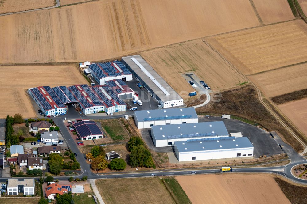 Luftaufnahme Steinfeld - Werksgelände der SCHMELZMETALL Deutschland GmbH und der INHATEC GmbH & Co. KG an der Raiffeisenstraße im Ortsteil Hausen in Steinfeld im Bundesland Bayern, Deutschland