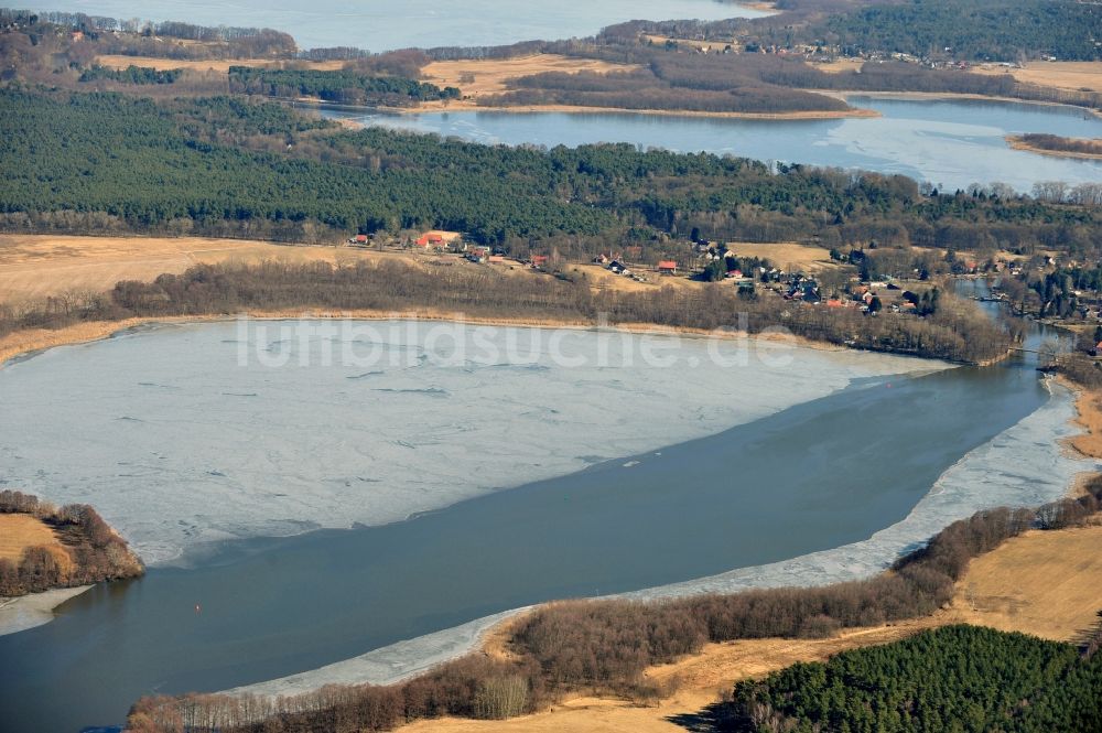 Luftbild Heidesee OT Gussow - Winterlich gefrorenen Dolgensee im Ortsteil Gussow im Bundesland Brandenburg