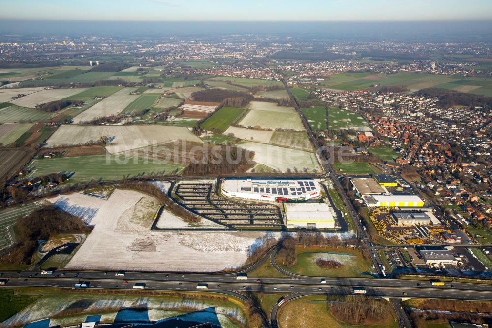 Luftbild Hamm - Winterlich schneebedecktes Gebäude des Einrichtungshaus - Möbelmarkt der finke Das Erlebnis-Einrichten GmbH & Co. KG in Hamm im Bundesland Nordrhein-Westfalen