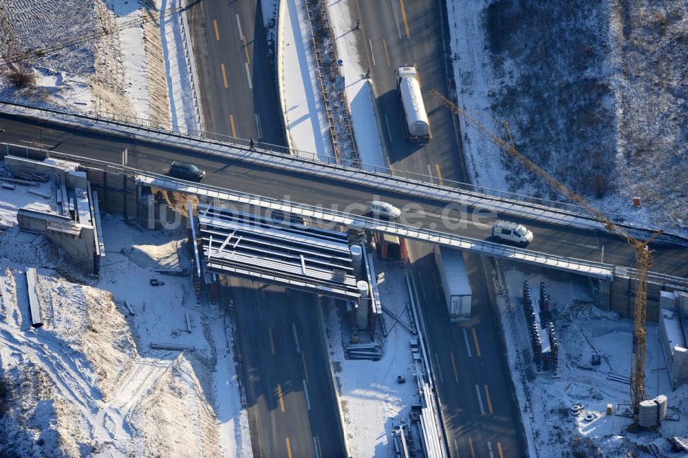 SCHWANEBECK aus der Vogelperspektive: Winterlich verschneite Baustelle Autobahndreieck / interchange Schwanebeck, auch Autobahndreieck Kreuz Barnim genannt