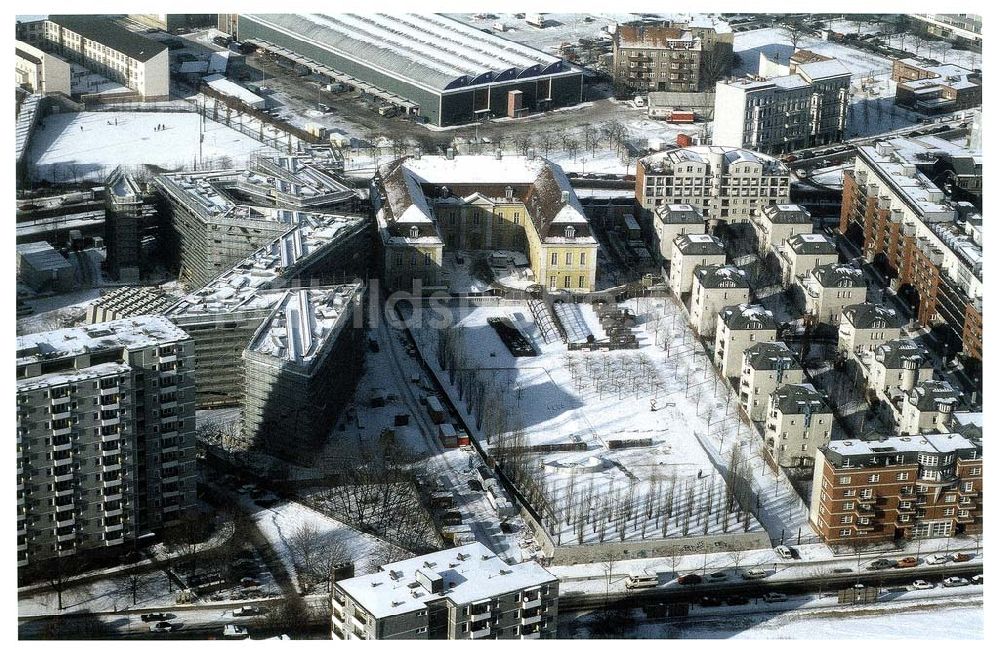 Luftaufnahme Berlin - Kreuzberg - Winterliche Stimmung auf der Baustelle des Jüdischen Museums in der Lindenstraße in Berlin - Kreuzberg.