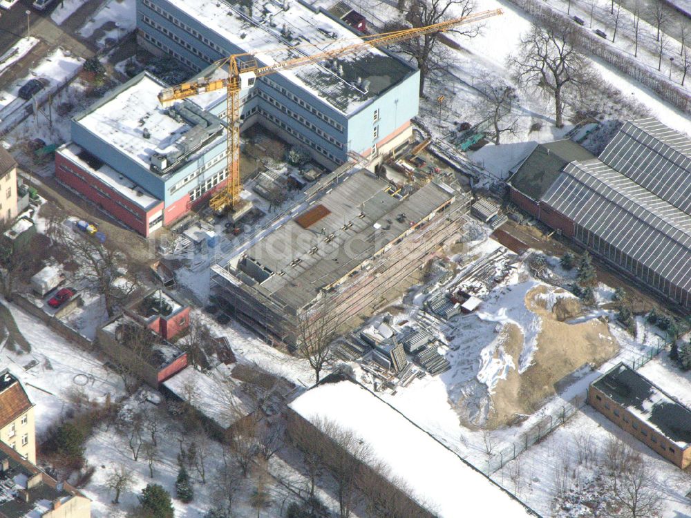 Luftaufnahme Berlin - Winterluftbild Baustelle zum Neubau eines Forschungs- Gebäudes und Bürokomplex Leibniz-Institut für Zoo- und Wildtierforschung (IZW) in Berlin, Deutschland