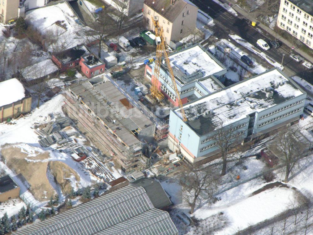 Luftaufnahme Berlin - Winterluftbild Baustelle zum Neubau eines Forschungs- Gebäudes und Bürokomplex Leibniz-Institut für Zoo- und Wildtierforschung (IZW) in Berlin, Deutschland