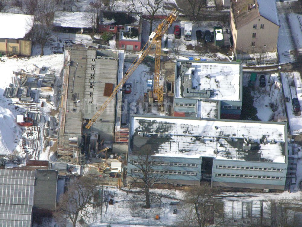 Berlin aus der Vogelperspektive: Winterluftbild Baustelle zum Neubau eines Forschungs- Gebäudes und Bürokomplex Leibniz-Institut für Zoo- und Wildtierforschung (IZW) in Berlin, Deutschland