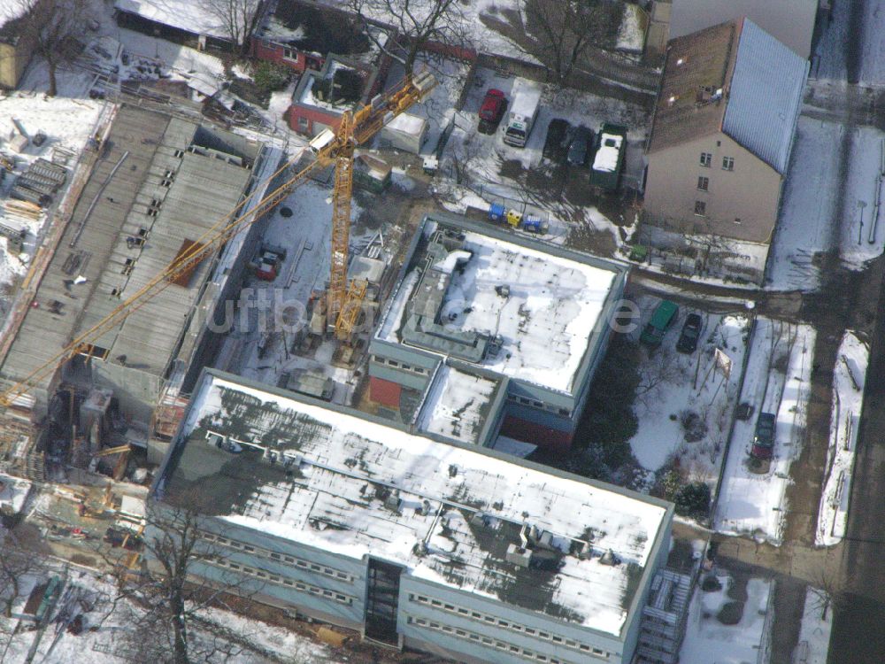 Luftbild Berlin - Winterluftbild Baustelle zum Neubau eines Forschungs- Gebäudes und Bürokomplex Leibniz-Institut für Zoo- und Wildtierforschung (IZW) in Berlin, Deutschland