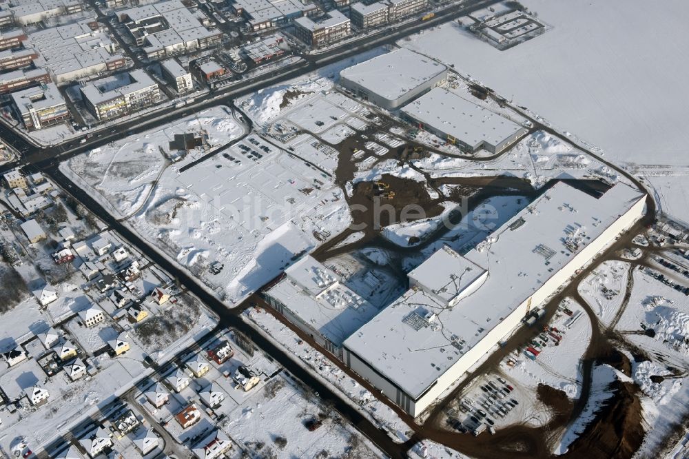 Luftbild Berlin - Winterluftbild Baustelle zum Neubau eines Möbelhauses der Porta-Gruppe in Mahlsdorf in Berlin